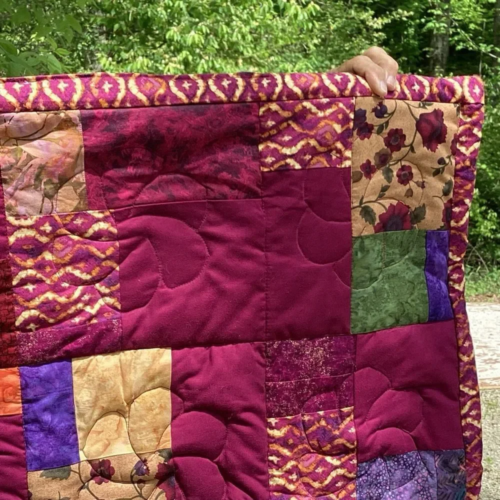 NWT. Hand Crafted Maroon/Wine Mixed Prints Lap Quilt